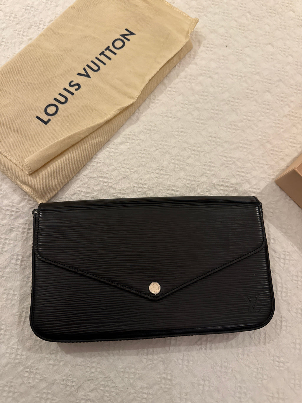 Louis Vuitton Pochette Félicie in black, black interior. 
EPI leather with a silver-tone chain strap