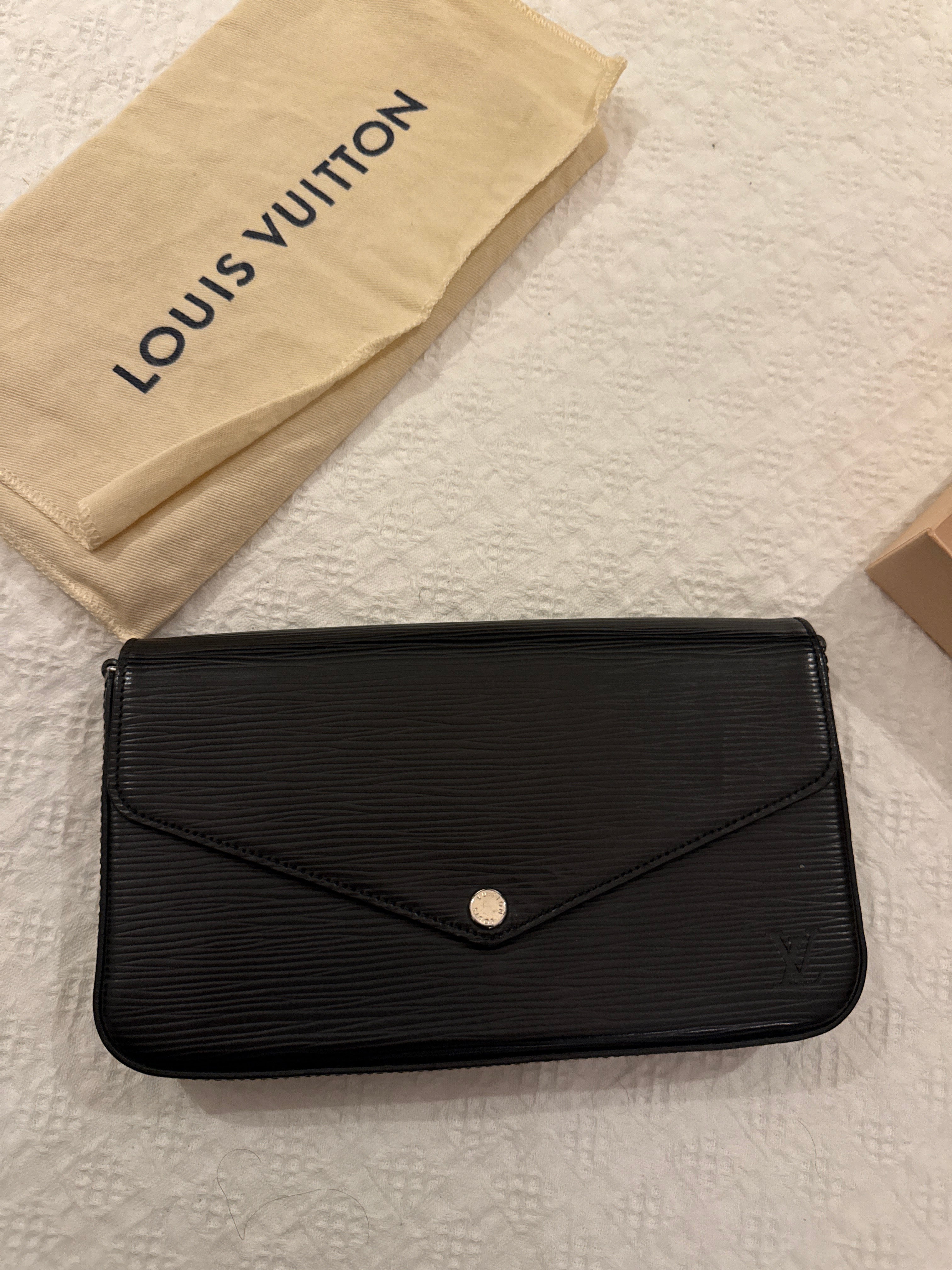 Louis Vuitton Pochette Félicie in black, black interior. 
EPI leather with a silver-tone chain strap