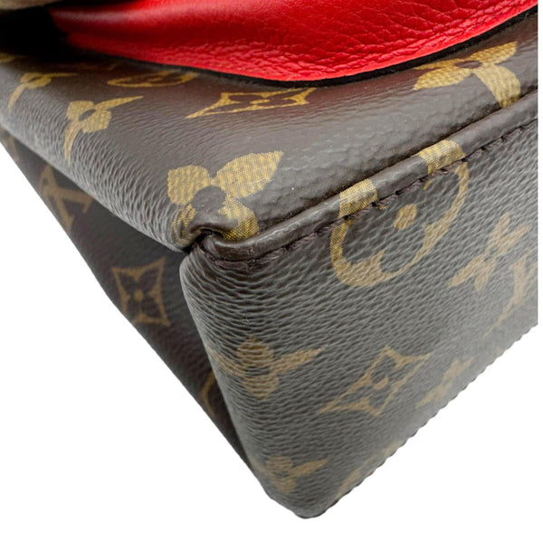 LOUIS VUITTON
Coquelicot Monogram Canvas Locky BB Bag