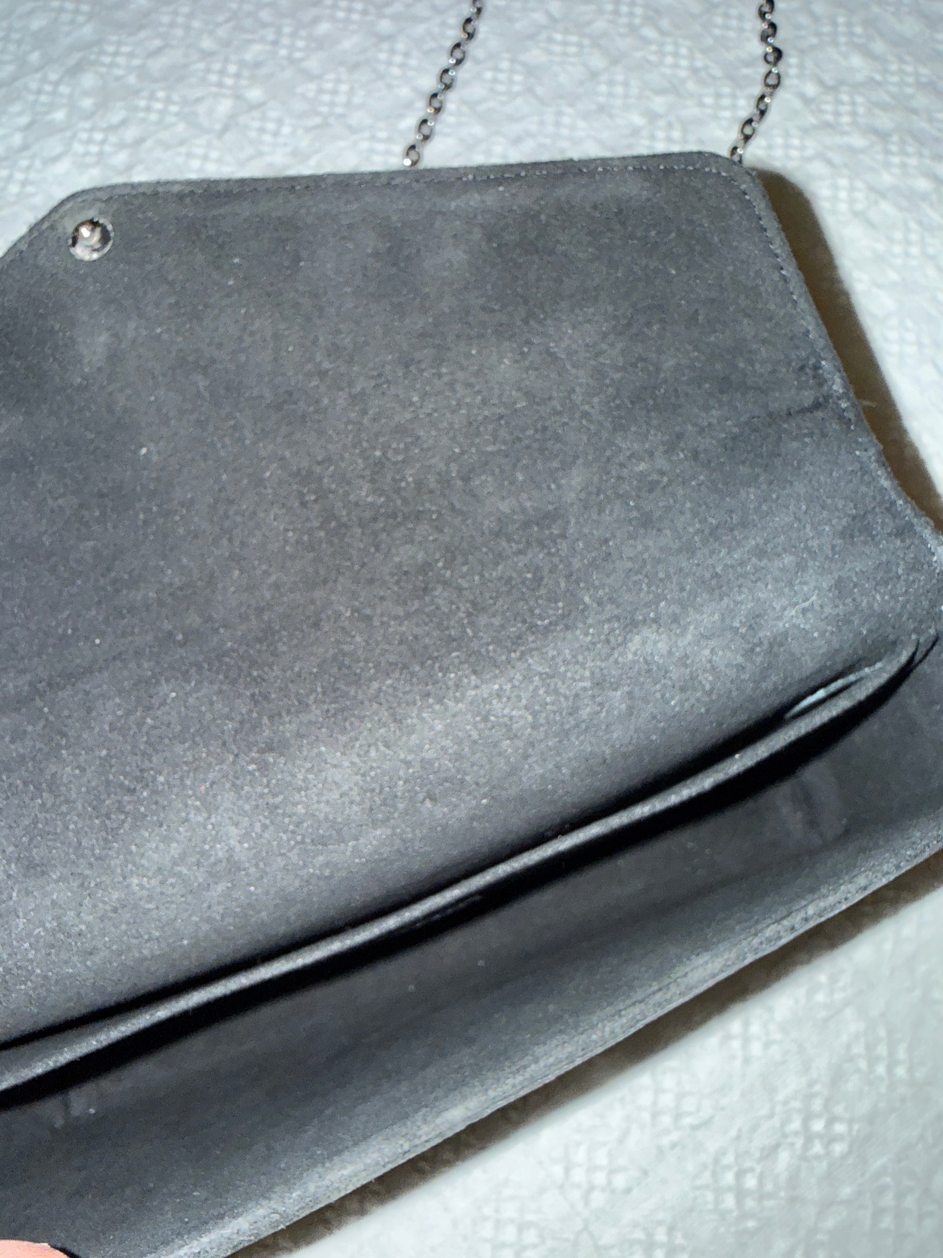 Louis Vuitton Pochette Félicie in black, black interior. 
EPI leather with a silver-tone chain strap