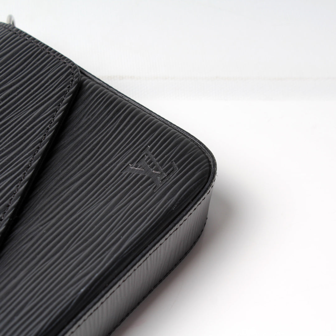 Louis Vuitton Pochette Félicie in black, black interior. 
EPI leather with a silver-tone chain strap