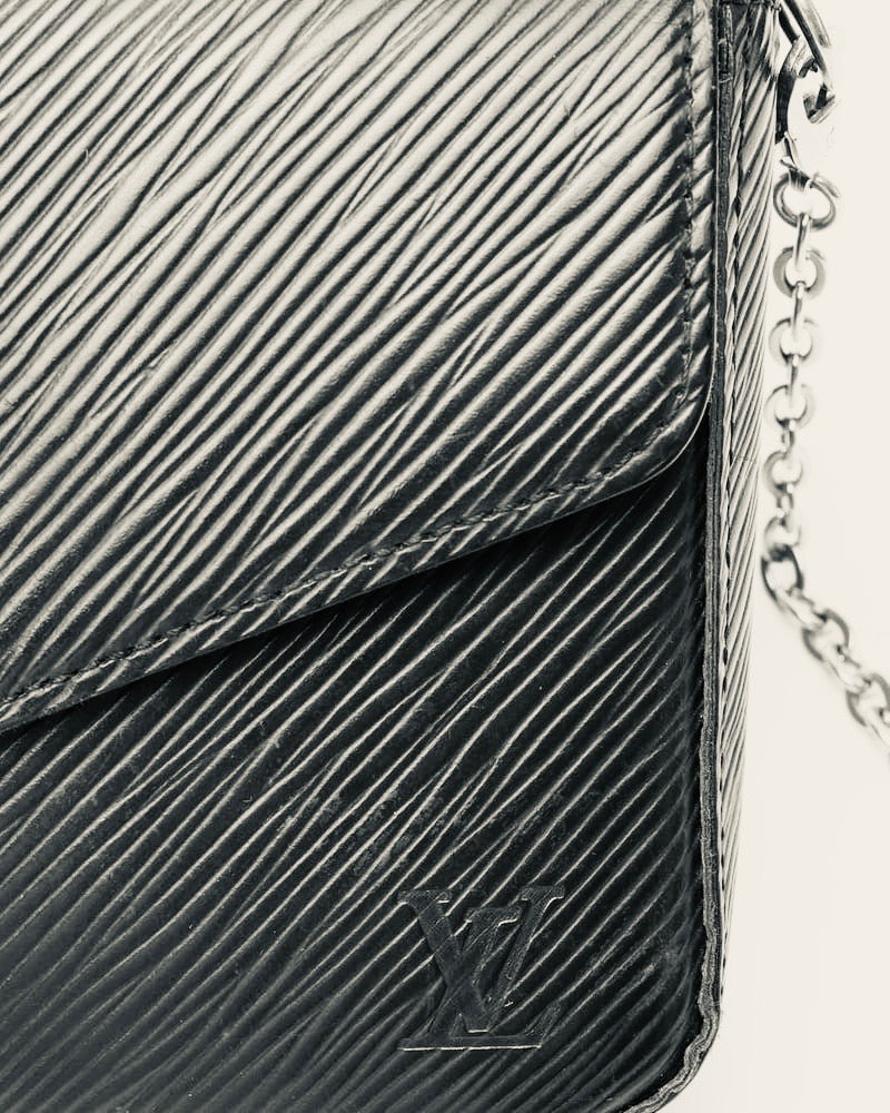 Louis Vuitton Pochette Félicie in black, black interior. 
EPI leather with a silver-tone chain strap