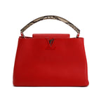 LOUIS VUITTON LV
Python top handle, Taurillon Capucines MM